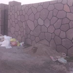 اجرای سنگ لاشه  دیوار نما ویلا باغچه